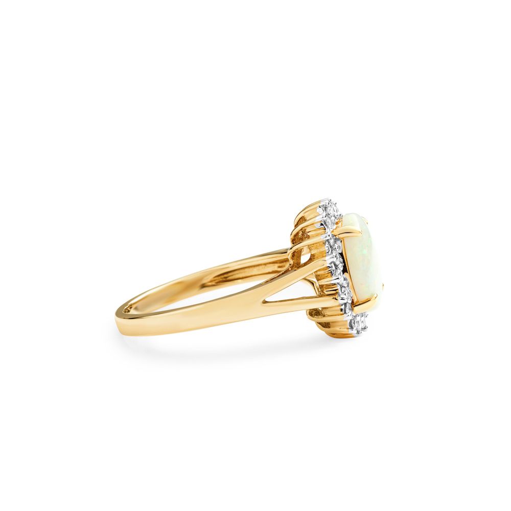 Oval Opal and Starburst Diamond Halo Ring in 14K Yellow Gold