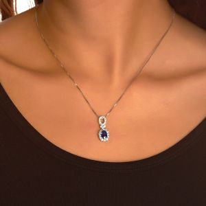Oval Sapphire and Diamond Loop Pendant in 18K White Gold