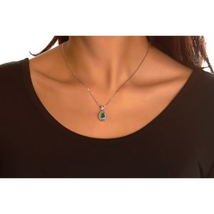 Emerald & Double Diamond Halo Pendant in 14K White Gold (7x5mm)